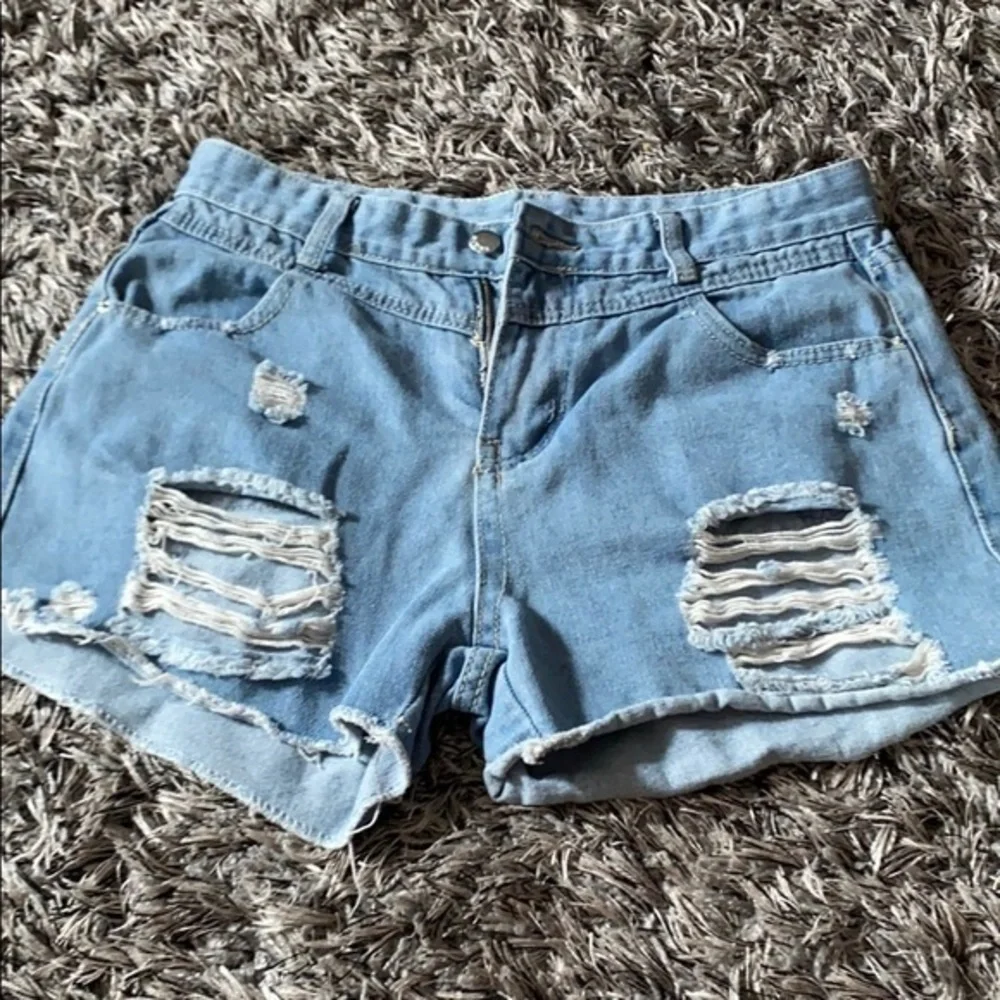 High waist destroyed denim shorts L fits M EUC.